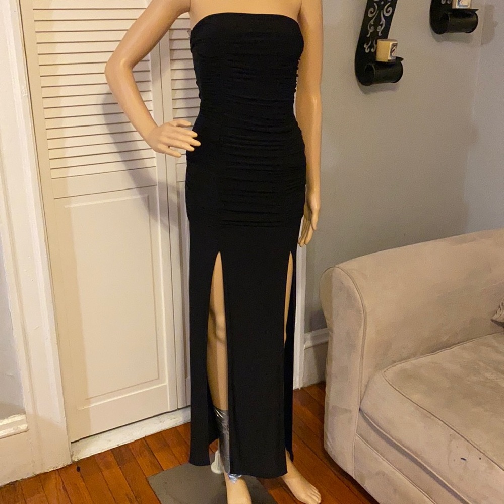 Black casual dress with two splits in the sides . Stretchy material